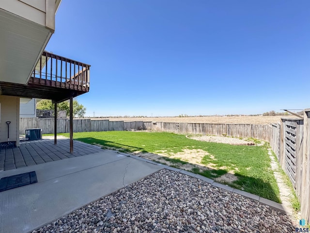 view of yard with a patio and a fenced backyard
