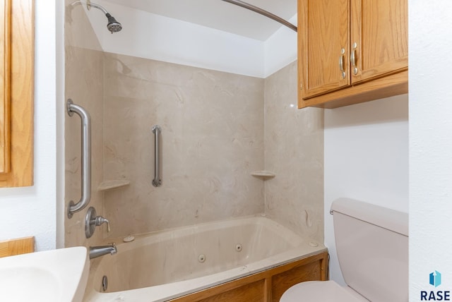 bathroom featuring a combined bath / shower with jetted tub and toilet