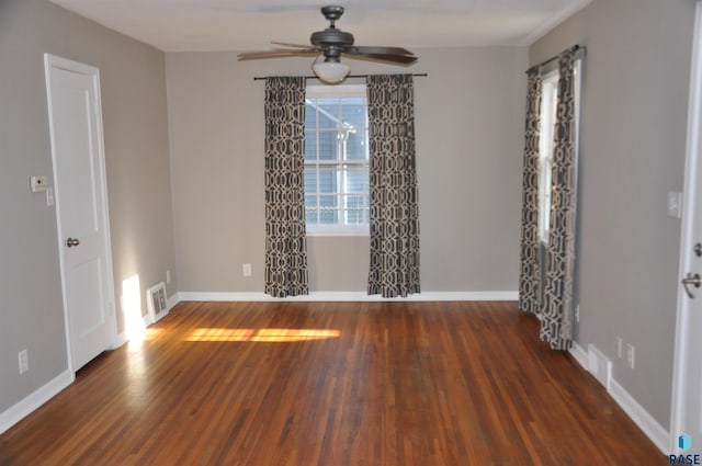 2911 S Norton Ave, Sioux Falls, SD 57105 - unfurnished room featuring baseboards, ceiling fan, visible vents, and wood finished floors