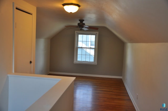 2911 S Norton Ave, Sioux Falls, SD 57105 - additional living space featuring baseboards, ceiling fan, vaulted ceiling, and dark wood-type flooring