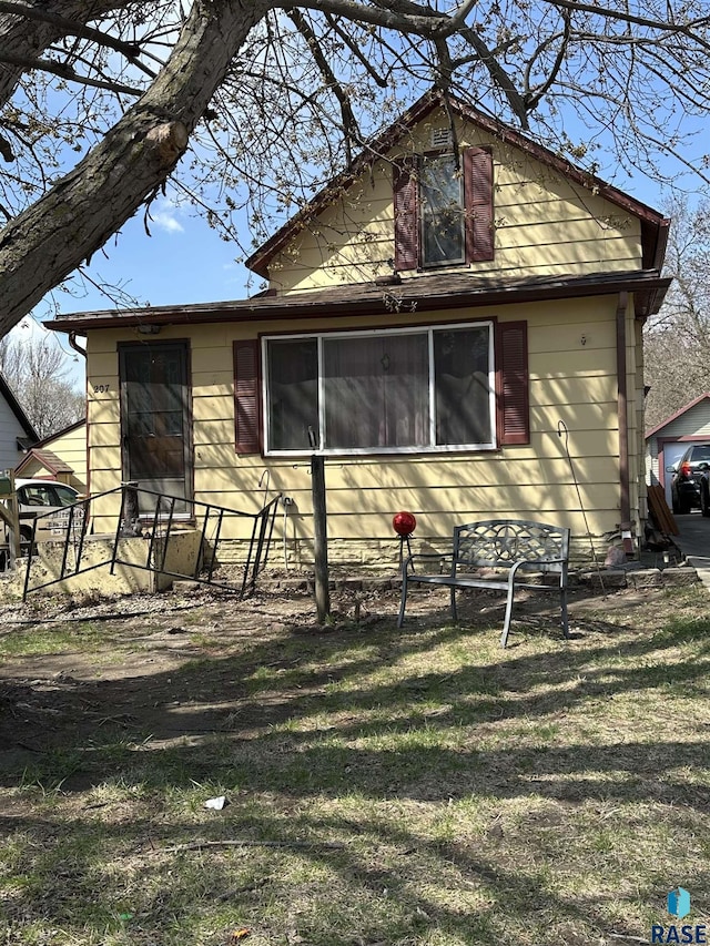 view of home's exterior featuring a lawn
