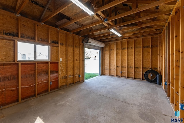 misc room with a garage