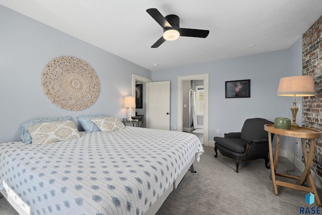 carpeted bedroom featuring baseboards, a ceiling fan, and brick wall