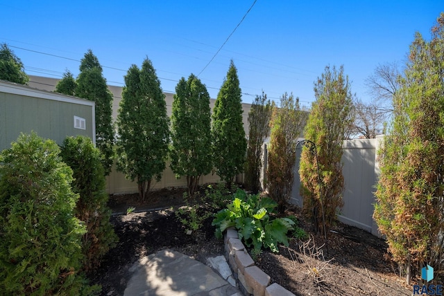 view of yard featuring fence