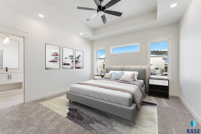 2700 N Vermillion Cir, Tea, SD 57064 - bedroom featuring recessed lighting, a tray ceiling, baseboards, and carpet