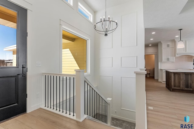 2700 N Vermillion Cir, Tea, SD 57064 - interior space with recessed lighting, a notable chandelier, and wood finished floors