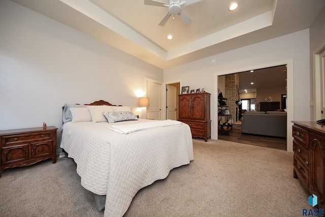 bedroom featuring recessed lighting, ceiling fan, and light carpet