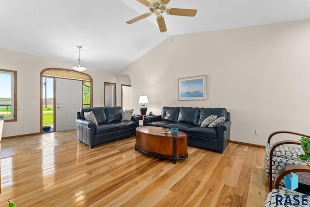 47604 255th St, Garretson, SD 57030 - living area featuring light wood-style flooring, baseboards, a healthy amount of sunlight, and lofted ceiling