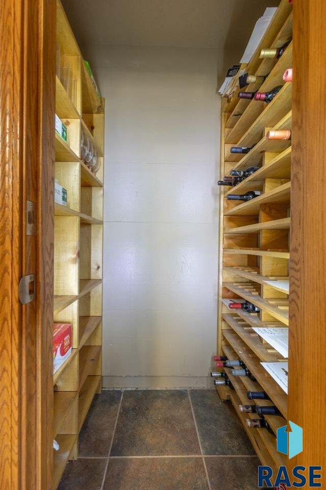 47604 255th St, Garretson, SD 57030 - wine cellar featuring stone tile floors
