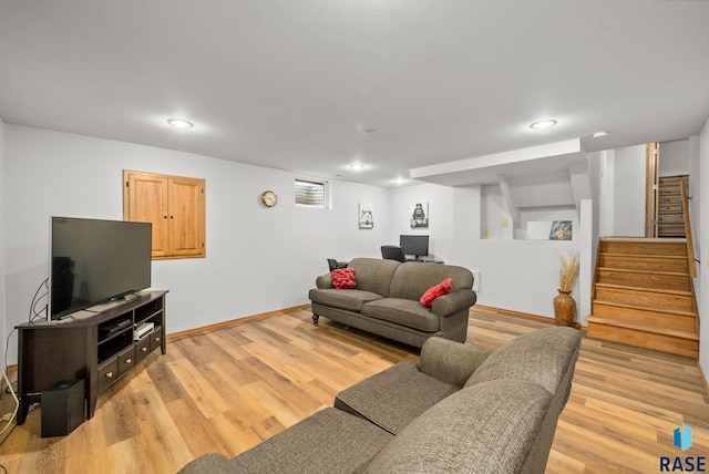 5215 E Belmont St, Sioux Falls, SD 57110 - living room with baseboards, recessed lighting, light wood finished floors, and stairway