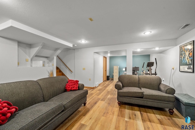 5215 E Belmont St, Sioux Falls, SD 57110 - living room with light wood-style floors, recessed lighting, stairs, and visible vents