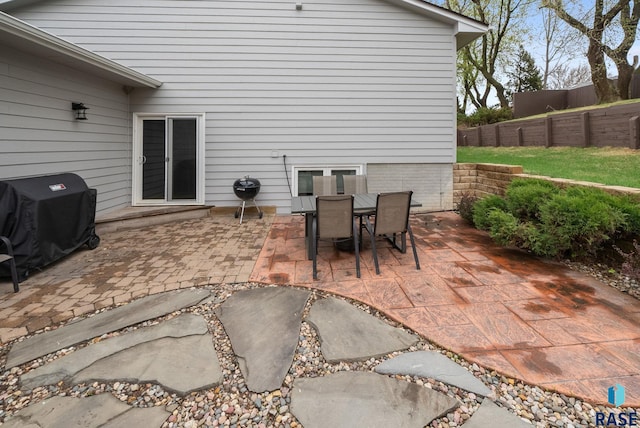 5215 E Belmont St, Sioux Falls, SD 57110 - view of patio / terrace featuring outdoor dining space, fence, and a grill
