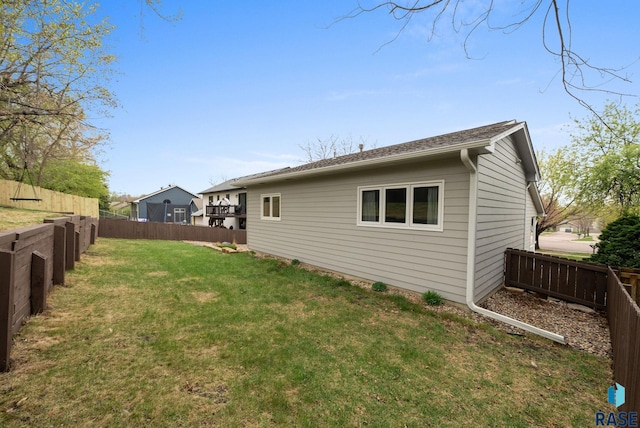 5215 E Belmont St, Sioux Falls, SD 57110 - exterior space featuring a lawn and a fenced backyard