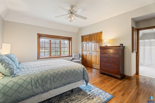 1705 N Deer Hollow Cir, Sioux Falls, SD 57110 - bedroom with baseboards, ceiling fan, and light wood finished floors