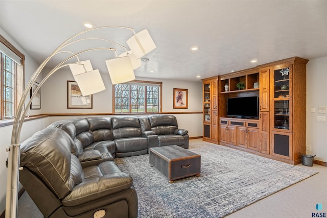 1705 N Deer Hollow Cir, Sioux Falls, SD 57110 - living area featuring baseboards, plenty of natural light, carpet, and recessed lighting