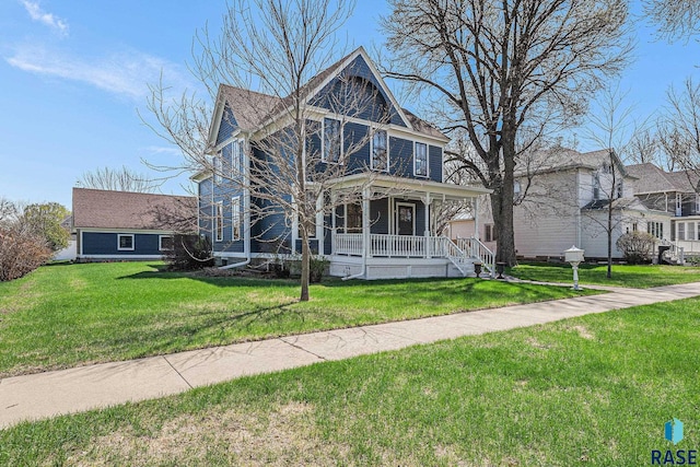 view of front of home featuring a porch and a front lawn