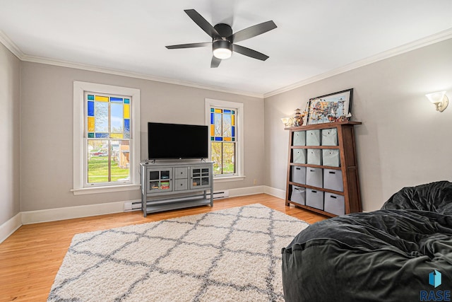 bedroom featuring crown molding, baseboards, and baseboard heating