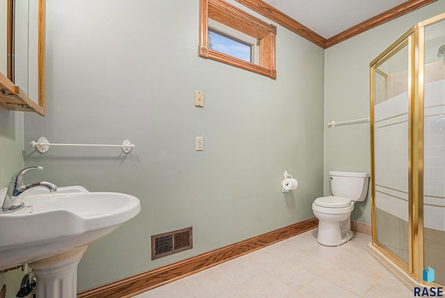 full bathroom featuring visible vents, crown molding, toilet, and a shower stall