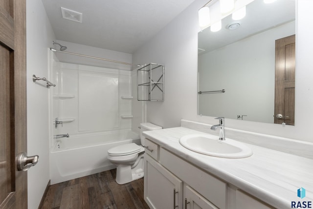 5400 S Whisper Cove Trl, Sioux Falls, SD 57108 - full bathroom featuring vanity, toilet, wood finished floors, shower / bathing tub combination, and visible vents