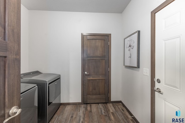 5400 S Whisper Cove Trl, Sioux Falls, SD 57108 - clothes washing area featuring baseboards, laundry area, dark wood-type flooring, and washer and dryer