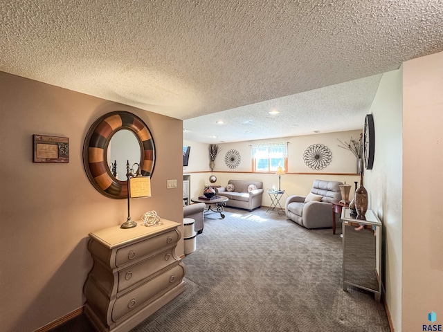 living room with carpet, recessed lighting, and a textured ceiling