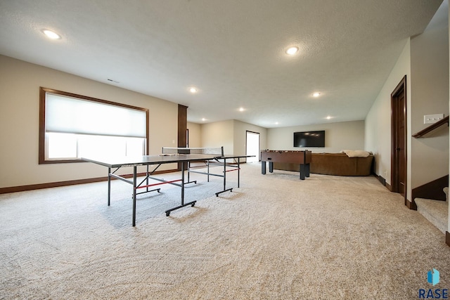 recreation room featuring carpet floors, recessed lighting, baseboards, and plenty of natural light