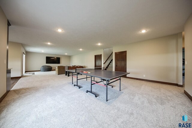 rec room with carpet floors, recessed lighting, and baseboards