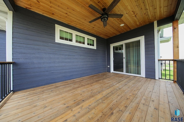 wooden deck with ceiling fan