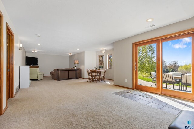 interior space featuring visible vents, recessed lighting, and baseboards