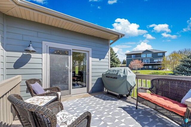 wooden terrace with grilling area
