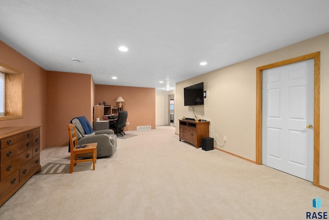 living area with recessed lighting, baseboards, visible vents, and carpet