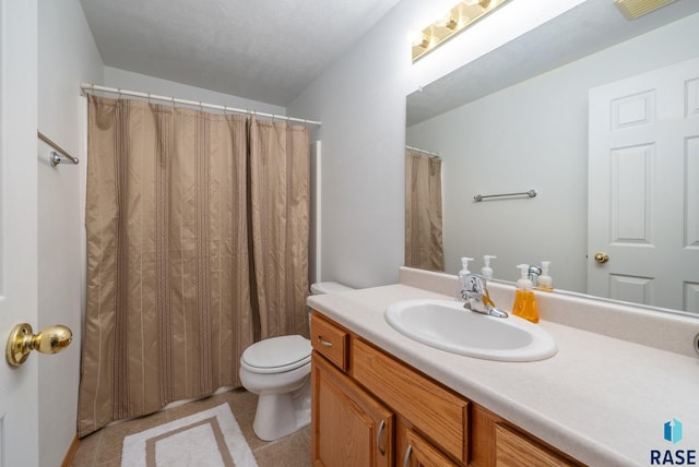 full bath with vanity, tile patterned flooring, toilet, and visible vents