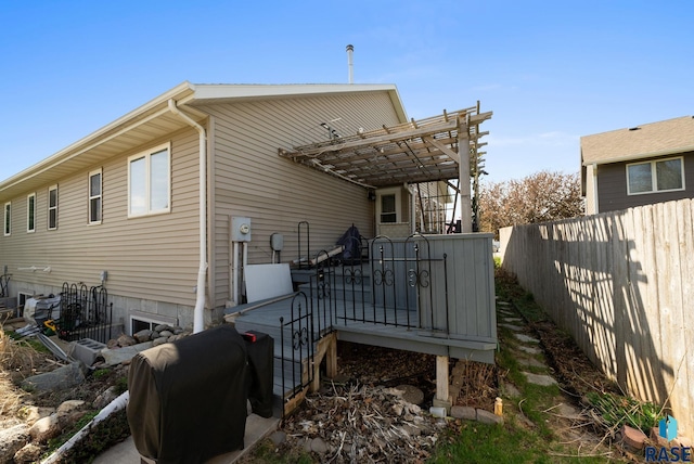 1012 E Magnolia Dr, Brandon, SD 57005 - rear view of property with fence and a pergola