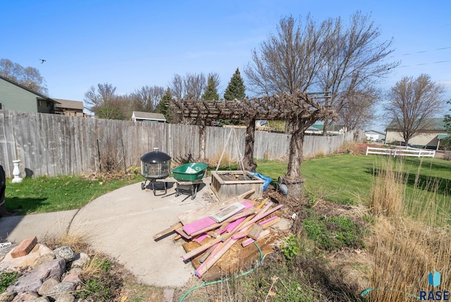 view of yard with a patio area and fence