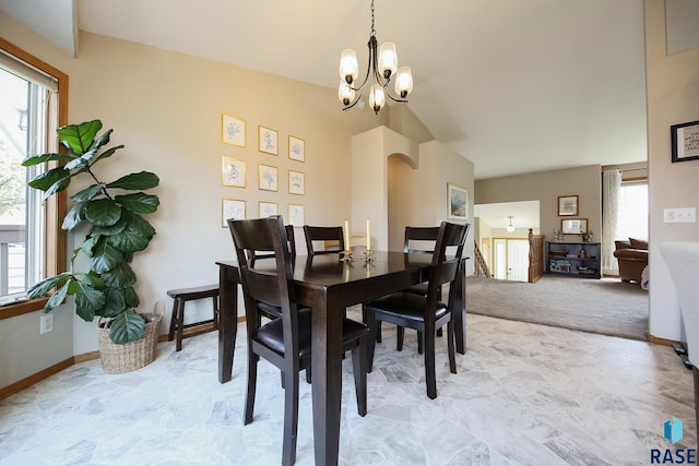 3219 S Grace Ave, Sioux Falls, SD 57103 - dining space featuring an inviting chandelier, baseboards, and stone finish flooring