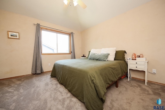 3219 S Grace Ave, Sioux Falls, SD 57103 - bedroom with a ceiling fan, baseboards, light colored carpet, and vaulted ceiling