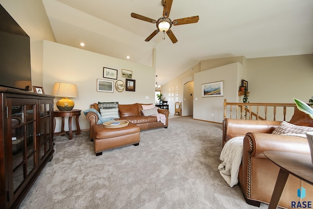 3219 S Grace Ave, Sioux Falls, SD 57103 - carpeted living area featuring arched walkways, a ceiling fan, recessed lighting, baseboards, and lofted ceiling