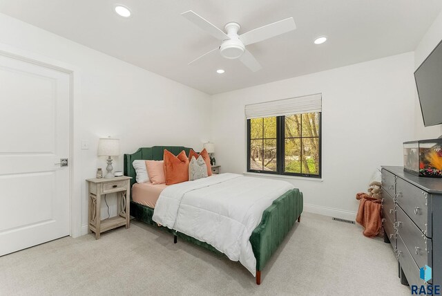 bedroom with visible vents, a ceiling fan, recessed lighting, and light colored carpet