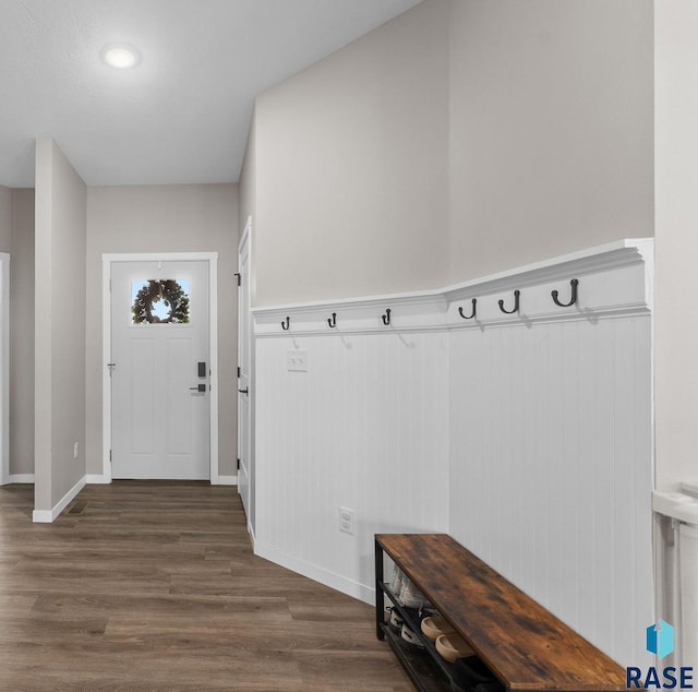 mudroom with baseboards and dark wood-style floors