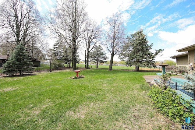 view of yard featuring fence