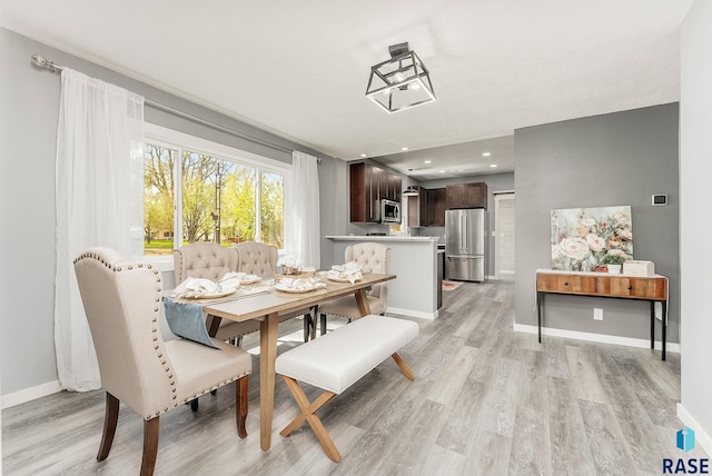 333 S Juniper Ave, Parker, SD 57053 - dining area featuring recessed lighting, baseboards, and light wood-type flooring