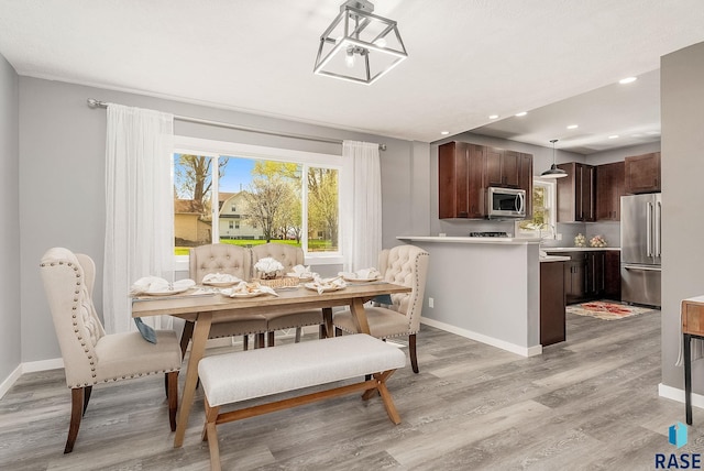 333 S Juniper Ave, Parker, SD 57053 - dining room with light wood-style floors, recessed lighting, and baseboards
