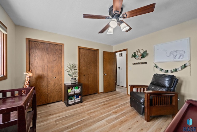 4108 E 23rd St, Sioux Falls, SD 57103 - sitting room featuring ceiling fan and light wood-type flooring