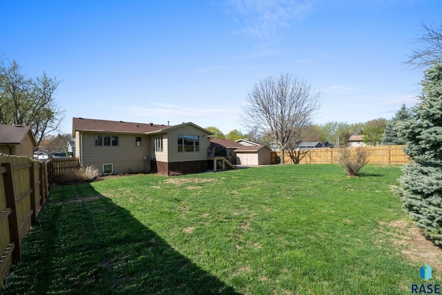 4108 E 23rd St, Sioux Falls, SD 57103 - view of yard featuring a fenced backyard, an outdoor structure, and a shed
