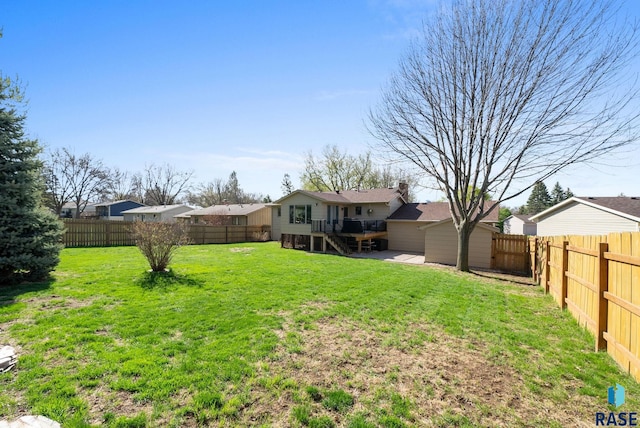 4108 E 23rd St, Sioux Falls, SD 57103 - view of yard with a fenced backyard, stairs, a residential view, and a wooden deck