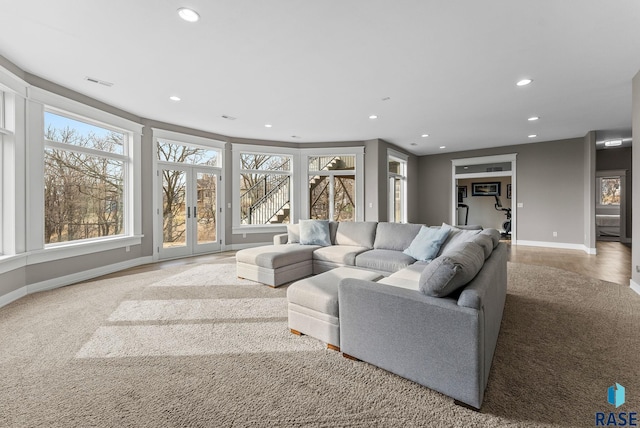 living room featuring french doors, recessed lighting, baseboards, and visible vents