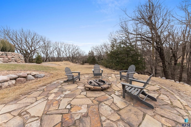 view of patio / terrace featuring a fire pit