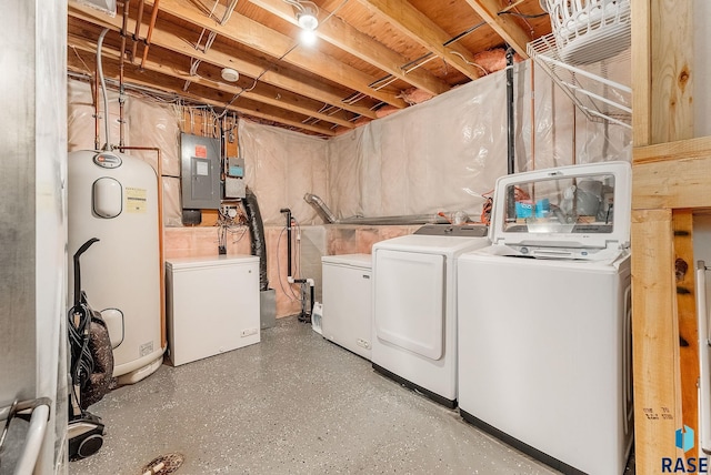 washroom with water heater, electric panel, laundry area, and washer and dryer