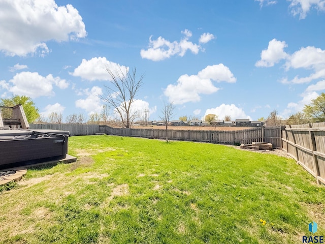 view of yard with a fenced backyard