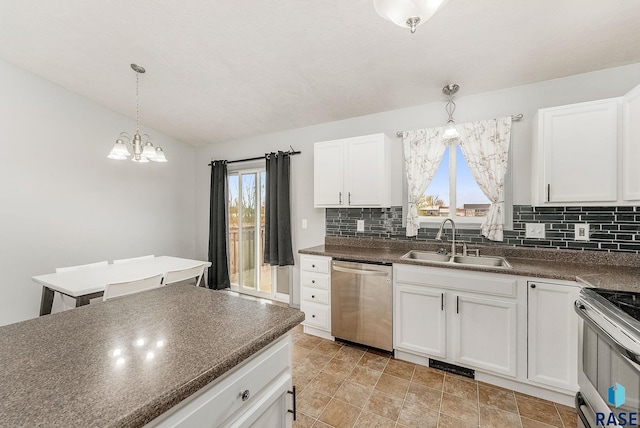 kitchen featuring a sink, tasteful backsplash, dark countertops, and stainless steel appliances